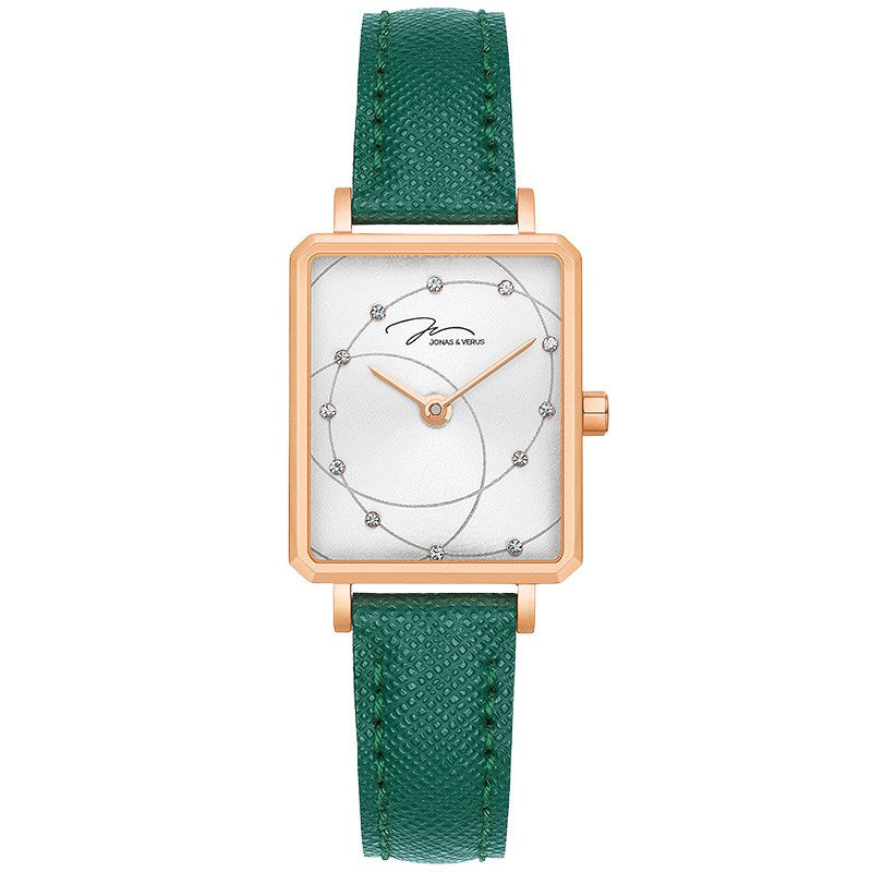 Watch with green strap and rose gold case on white background